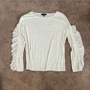 Cream long sleeve shirt with ruffled sleeves